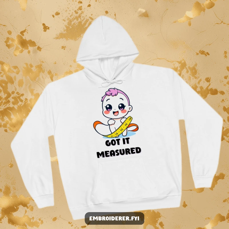 Funny hoodie showing a cheerful character measuring fabric with a colorful tape measure, perfect for cozy crafting sessions.