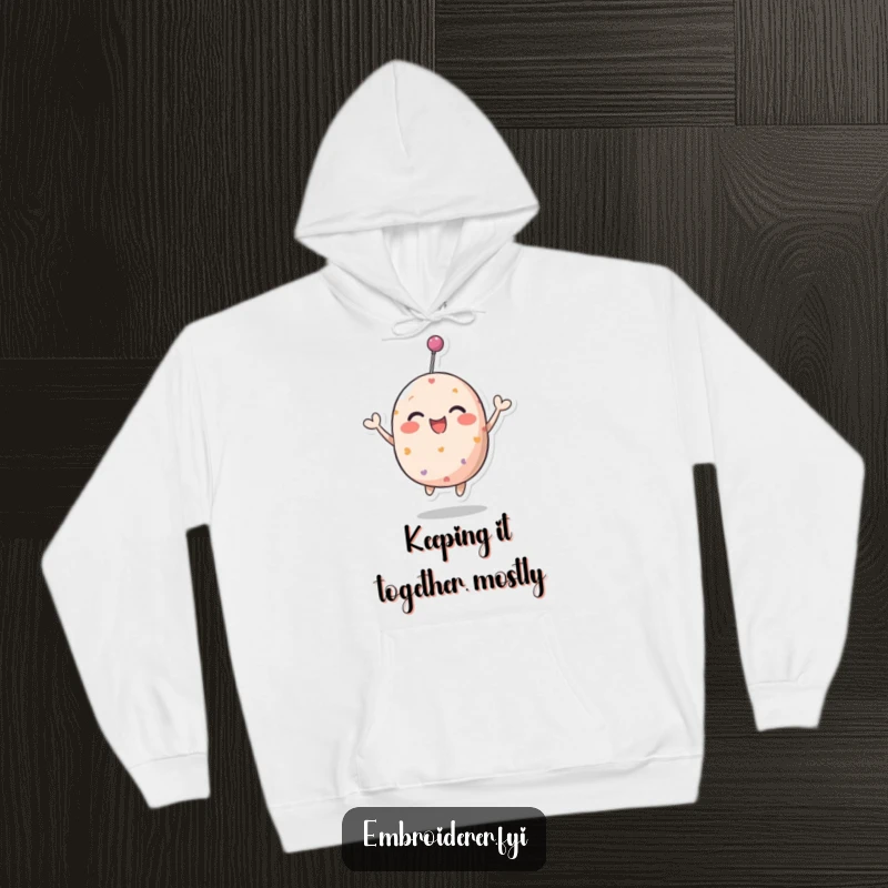 Funny pincushion hoodie showcasing a happy character mid-bounce, offering ultimate comfort and humor.
