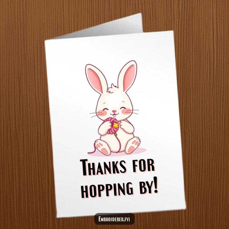 Funny free printable thank you card: a cheerful rabbit embroiders a flower with bright yarn to show thanks.