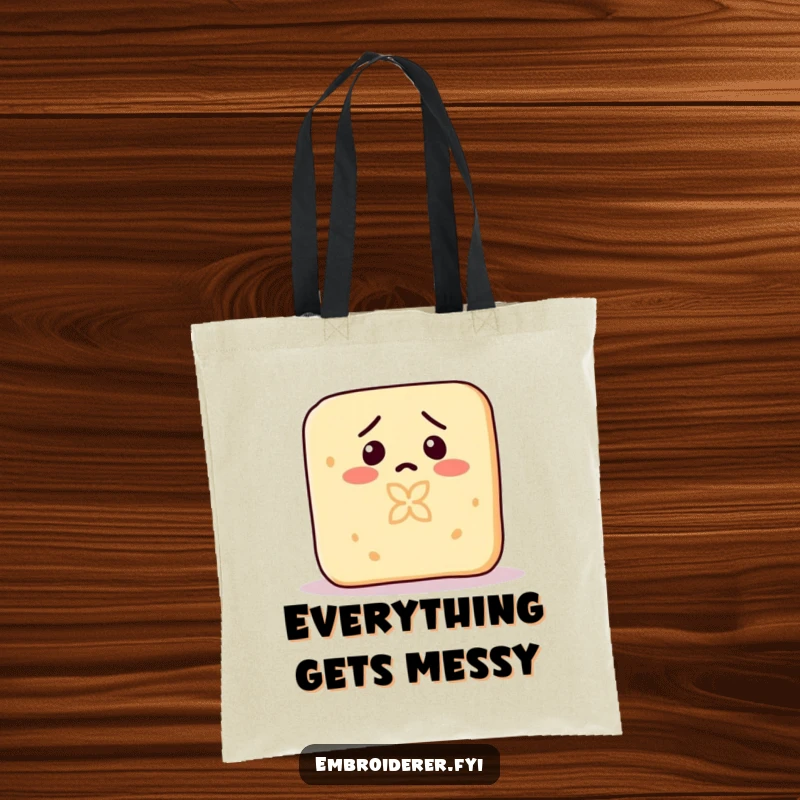 Funny tote bag with a confused bar of soap hilariously carving a small pattern into itself.